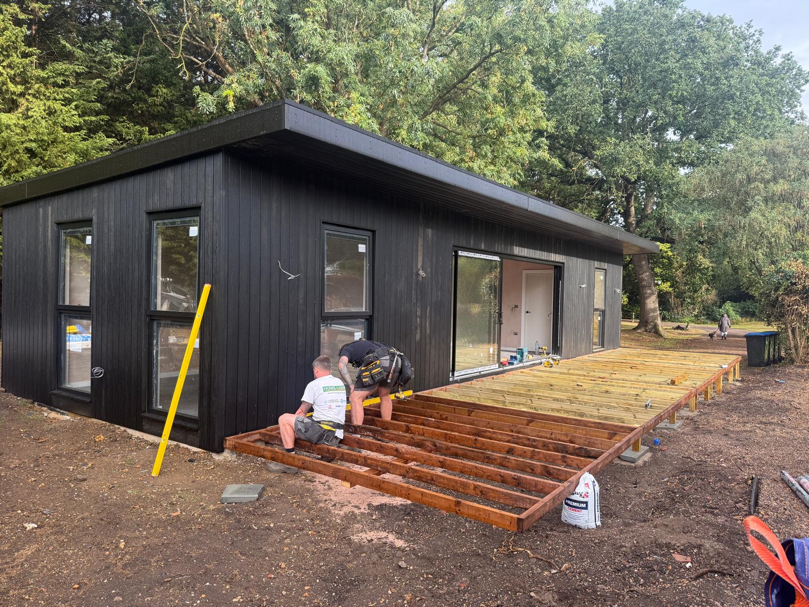 Decking sub-frame being built alongside the completed annexe